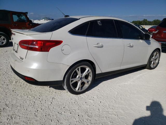 Photo 3 from auction – 2016 FORD FOCUS TITA with VIN 1FADP3J29GL381909