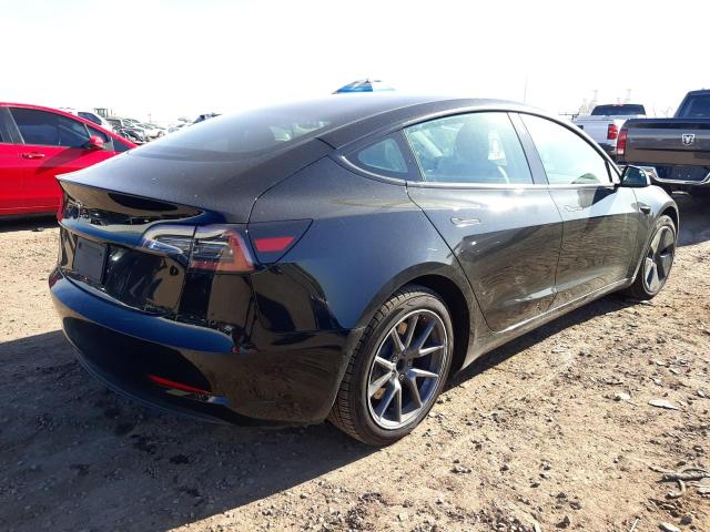 Photo 3 from auction – 2021 TESLA MODEL 3 with VIN 5YJ3E1EA5MF090890