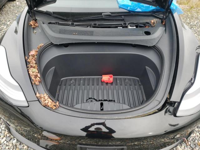 Photo 11 from auction – 2021 TESLA MODEL 3 with VIN 5YJ3E1EC2MF054446