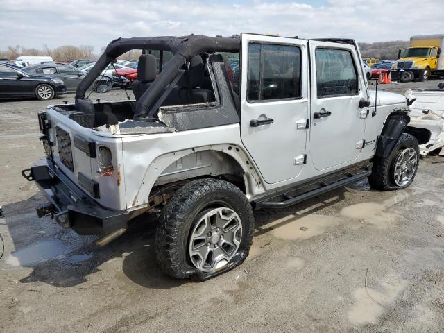 Photo 3 from auction – 2011 JEEP WRANGLER U with VIN 1J4BA3H13BL521732