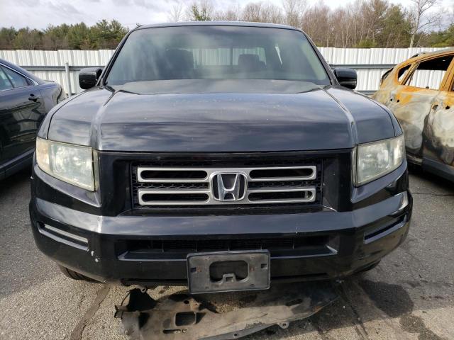 Photo 5 from auction – 2006 HONDA RIDGELINE with VIN 2HJYK16596H572870
