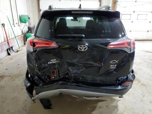 Photo 6 from auction – 2017 TOYOTA RAV4 XLE with VIN 2T3RFREV0HW668631