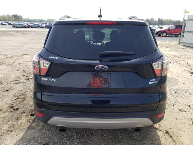 Photo 6 from auction – 2018 FORD ESCAPE SE with VIN 1FMCU9GD2JUA28824