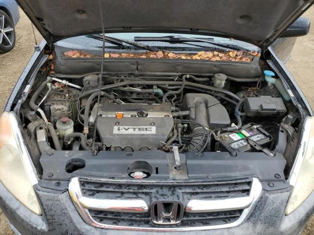 Photo 11 from auction – 2002 HONDA CR-V EX with VIN JHLRD78832C016633