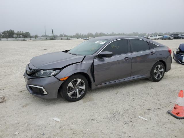 HONDA CIVIC LX 2019 with VIN 19XFC2F60KE030070 - Photo from auction