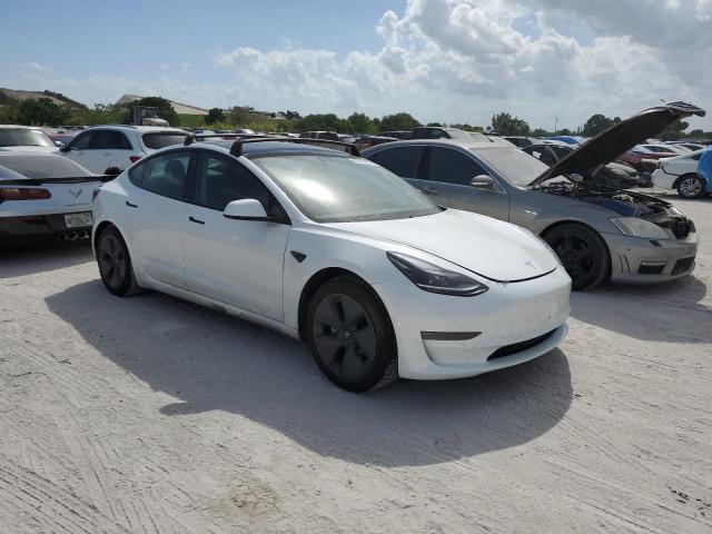 Photo 4 from auction – 2021 TESLA MODEL 3 with VIN 5YJ3E1EB8MF062428