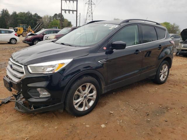 Photo 1 from auction – 2018 FORD ESCAPE SE with VIN 1FMCU0GD0JUB32143