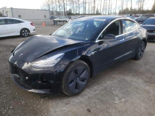 TESLA MODEL 3 2020 with VIN 5YJ3E1EA0LF611335 - Photo from auction
