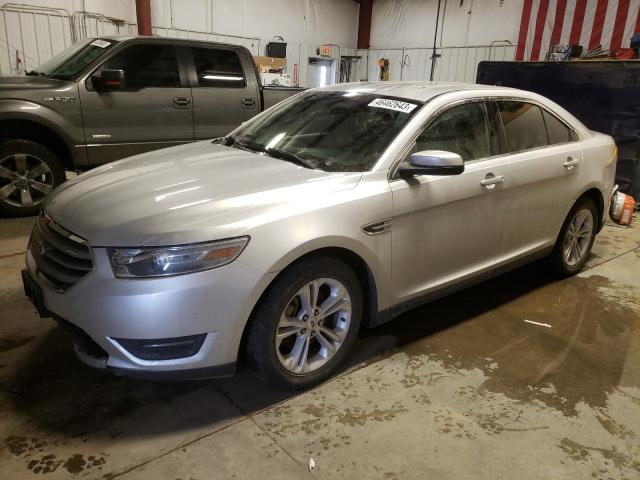 FORD TAURUS SEL 2014 with VIN 1FAHP2E82EG127300 - Photo from auction