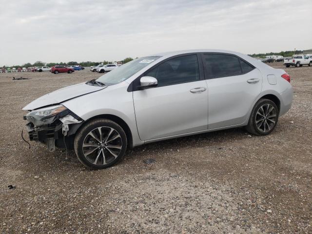 TOYOTA COROLLA L 2018 with VIN 5YFBURHE9JP831859 - Photo from auction