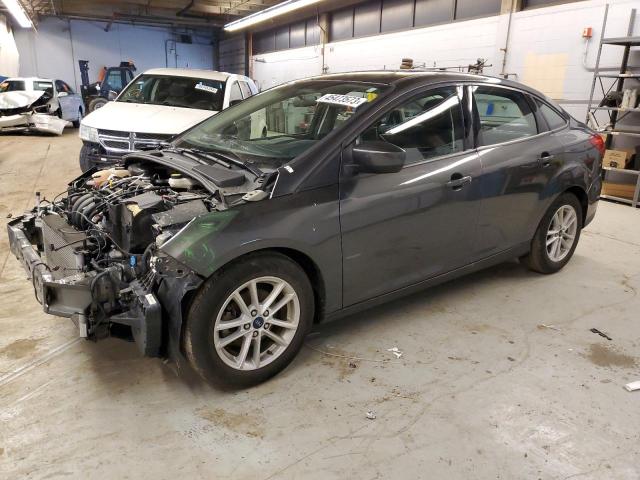 FORD FOCUS SE 2018 with VIN 1FADP3F21JL267046 - Photo from auction