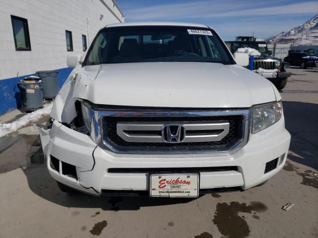 Photo 5 from auction – 2011 HONDA RIDGELINE with VIN 5FPYK1F45BB454172