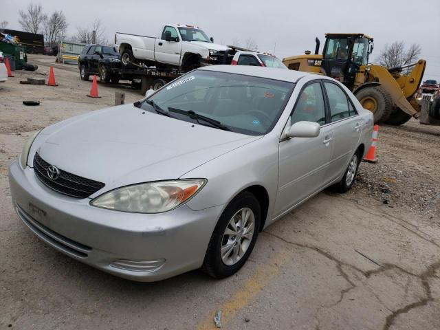 TOYOTA CAMRY LE 2004 with VIN 4T1BF32K84U579207 - Photo from auction