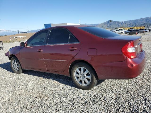 Photo 2 from auction – 2002 TOYOTA CAMRY LE with VIN 4T1BE30KX2U035875