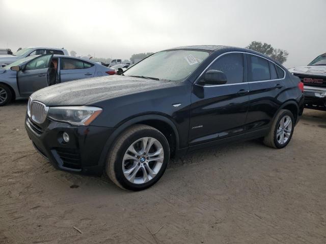 BMW X4 XDRIVE2 2015 with VIN 5UXXW3C59F0F89033 - Photo from auction