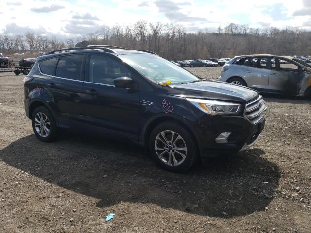 Photo 4 from auction – 2017 FORD ESCAPE SE with VIN 1FMCU9GD0HUC36887