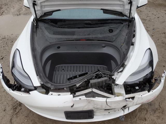 Photo 11 from auction – 2021 TESLA MODEL 3 with VIN 5YJ3E1EAXMF009611