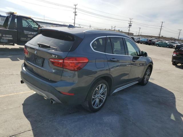 Photo 3 from auction – 2017 BMW X1 XDRIVE2 with VIN WBXHT3Z35H4A52260