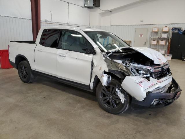 Photo 4 from auction – 2020 HONDA RIDGELINE with VIN 5FPYK3F18LB024946