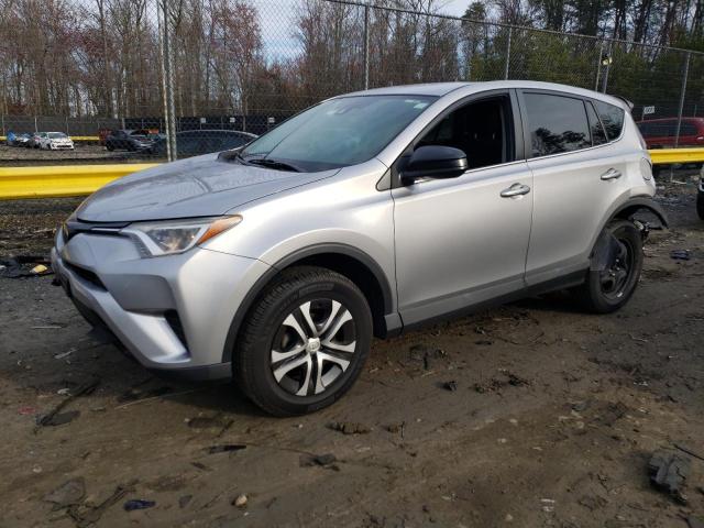 TOYOTA RAV4 LE 2018 with VIN 2T3BFREV2JW725709 - Photo from auction