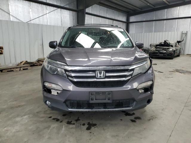 Фото 5 с аукциона – 2016 HONDA PILOT ELIT с VIN 5FNYF6H09GB045281