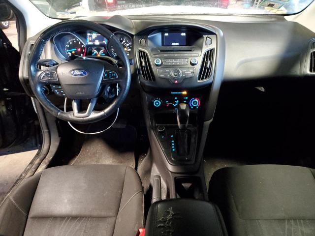 Photo 8 from auction – 2015 FORD FOCUS SE with VIN 1FADP3F21FL268544