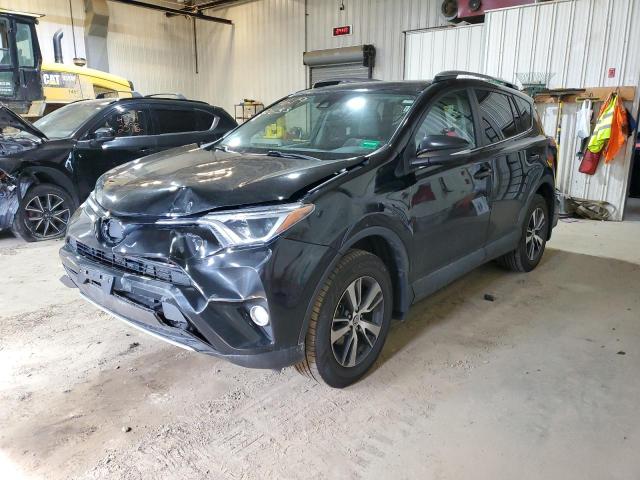 Photo 1 from auction – 2017 TOYOTA RAV4 XLE with VIN 2T3RFREV0HW668631