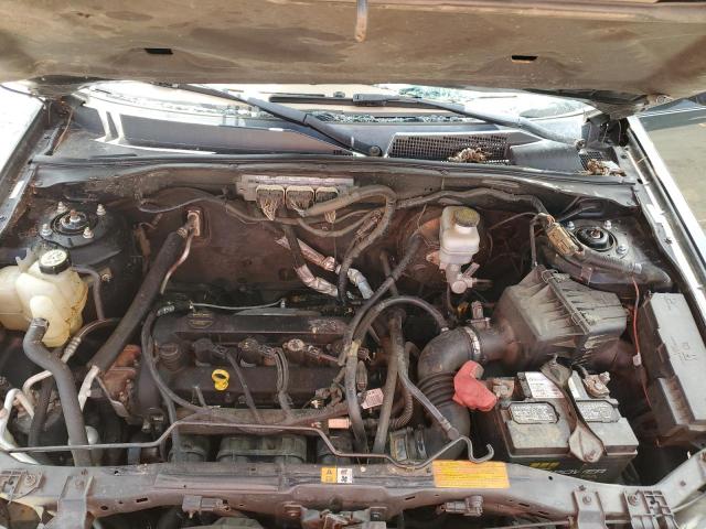 Photo 11 from auction – 2009 MAZDA TRIBUTE I with VIN 4F2CZ02729KM04481