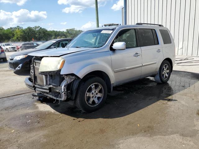 HONDA PILOT TOUR 2010 with VIN 5FNYF4H92AB013685 - Photo from auction