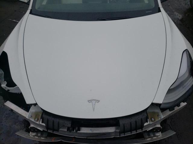 Photo 7 from auction – 2021 TESLA MODEL 3 with VIN 5YJ3E1EA2MF973149