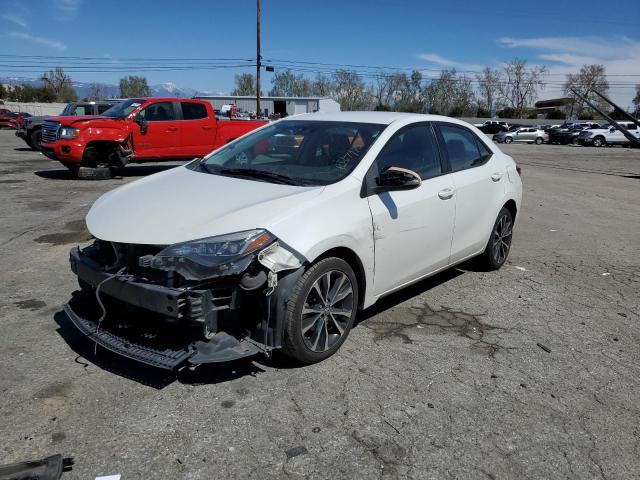 TOYOTA COROLLA L 2017 with VIN 5YFBURHE9HP692813 - Photo from auction