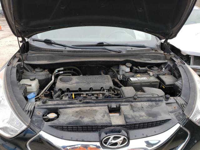 Photo 11 from auction – 2011 HYUNDAI TUCSON GLS with VIN KM8JUCACXBU293108