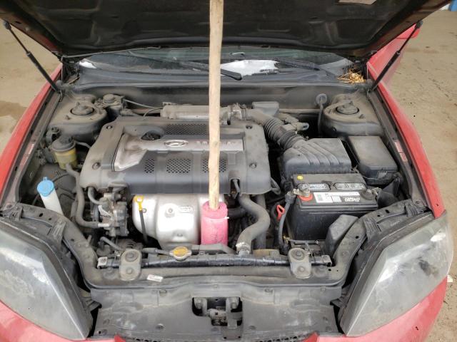 Photo 11 from auction – 2005 HYUNDAI TIBURON with VIN KMHHM65D65U155007