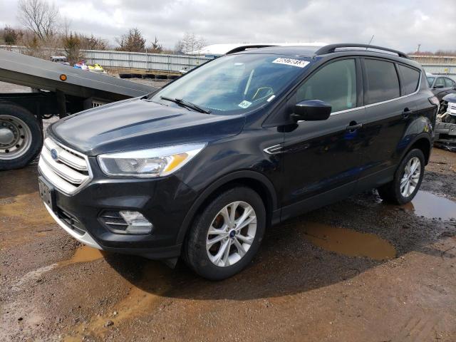 FORD ESCAPE SE 2018 with VIN 1FMCU9GD2JUD25608 - Photo from auction