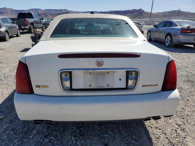 Photo 6 from auction – 2004 CADILLAC DEVILLE with VIN 1G6KD54Y74U158329
