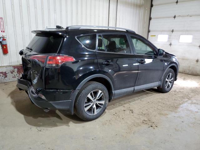 Photo 3 from auction – 2017 TOYOTA RAV4 XLE with VIN 2T3RFREV0HW668631