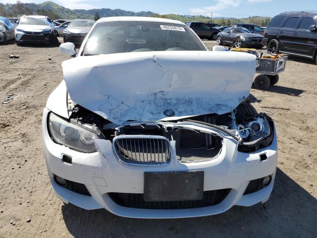 Photo 5 from auction – 2011 BMW 335 I with VIN WBADX7C53BE743381