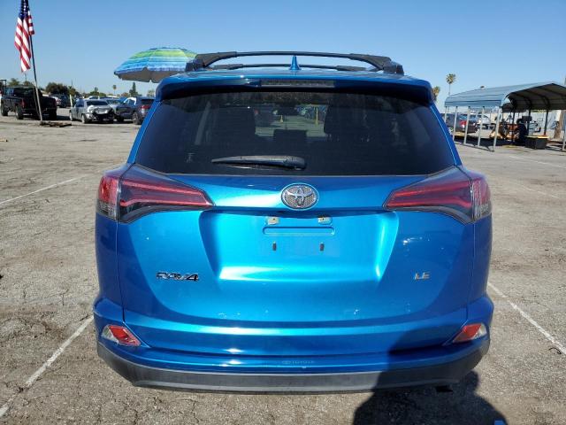 Photo 6 from auction – 2018 TOYOTA RAV4 LE with VIN JTMZFREV0JJ736785