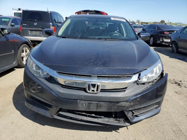 Photo 5 from auction – 2017 HONDA CIVIC LX with VIN 2HGFC2F51HH567830