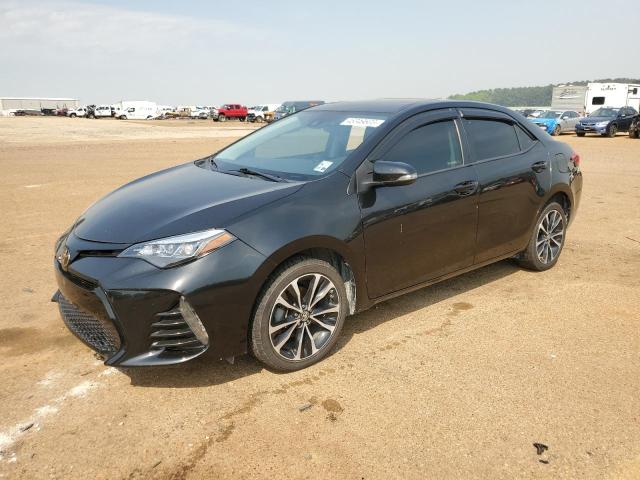 TOYOTA COROLLA L 2019 with VIN 5YFBURHE0KP882460 - Photo from auction
