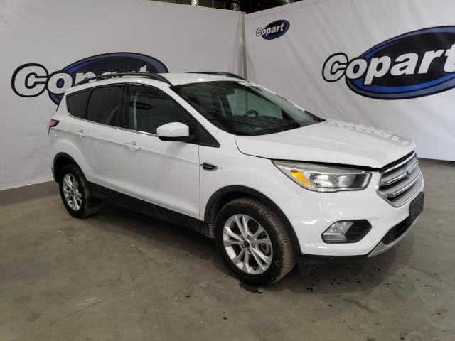 Photo 4 from auction – 2018 FORD ESCAPE SE with VIN 1FMCU9GD0JUA36467