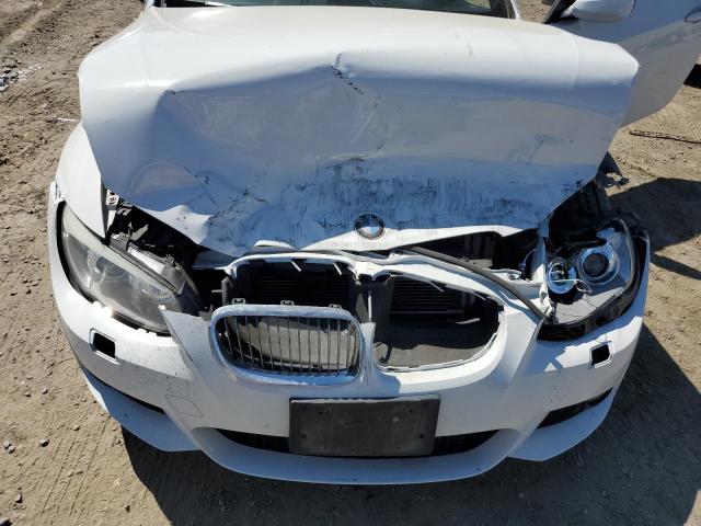 Photo 11 from auction – 2011 BMW 335 I with VIN WBADX7C53BE743381