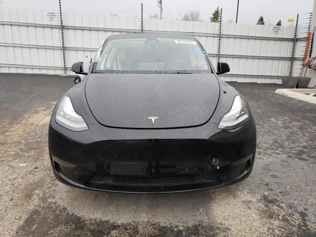 Photo 5 from auction – 2022 TESLA MODEL Y with VIN 7SAYGDEE3NF401595