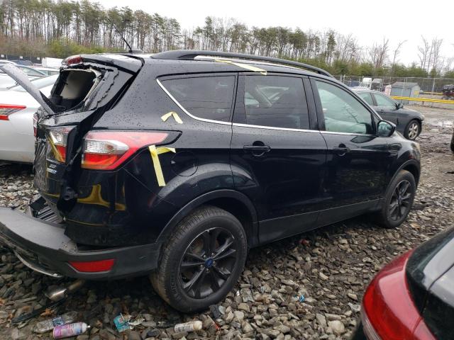Photo 3 from auction – 2018 FORD ESCAPE SE with VIN 1FMCU9GDXJUB19100