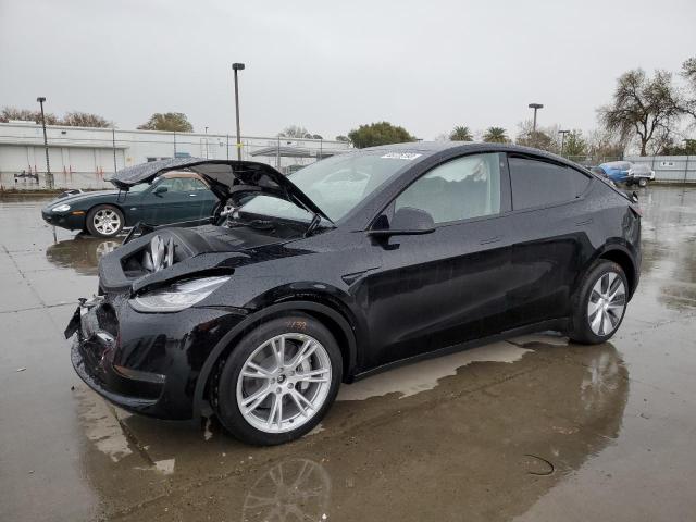TESLA MODEL Y 2023 with VIN 7SAYGDEE5PA082426 - Photo from auction