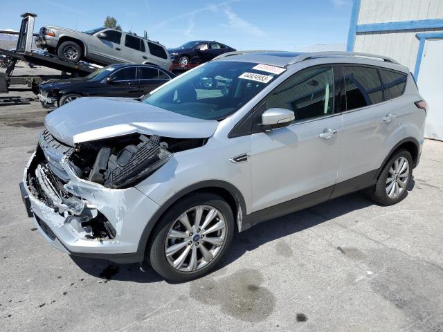 FORD ESCAPE TIT 2017 with VIN 1FMCU0J97HUD53141 - Photo from auction