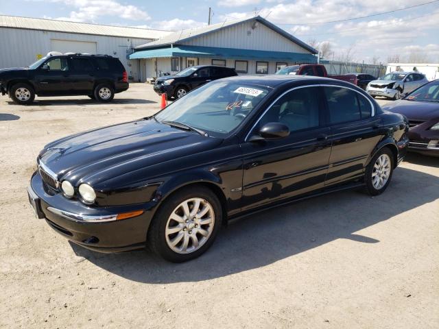 JAGUAR X-TYPE 2.5 2002 with VIN SAJEA51D82XC63661 - Photo from auction
