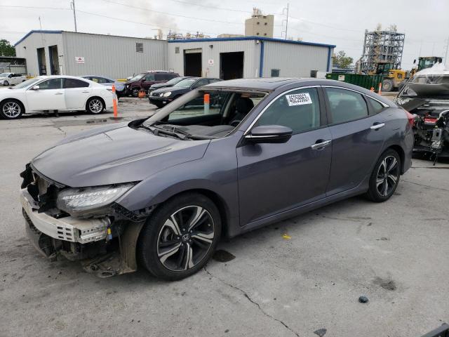 HONDA CIVIC TOUR 2017 with VIN 19XFC1F99HE014009 - Photo from auction