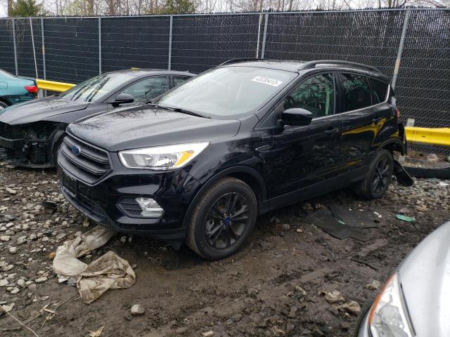 FORD ESCAPE SE 2018 with VIN 1FMCU9GDXJUB19100 - Photo from auction