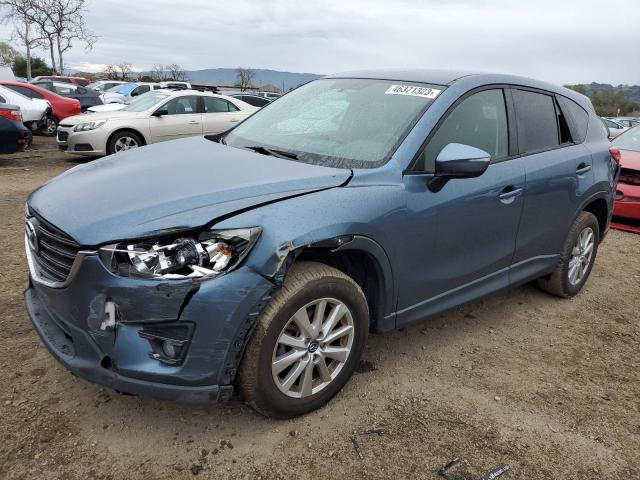 MAZDA CX-5 TOURI 2016 with VIN JM3KE2CY8G0638361 - Photo from auction